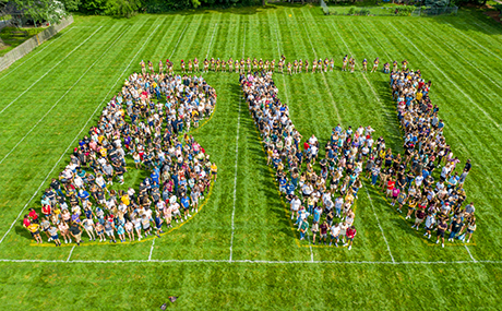 Photo of  first-year students making a B and W